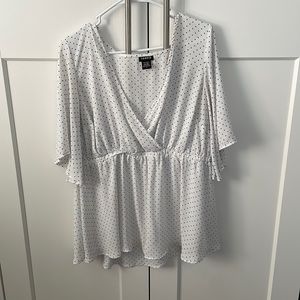 White torrid top with black polka dots, size 1